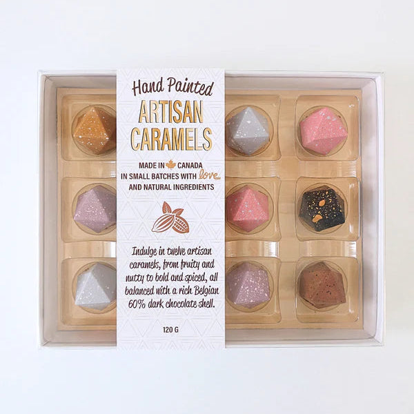 Box of hand-painted artisan caramels with a white background