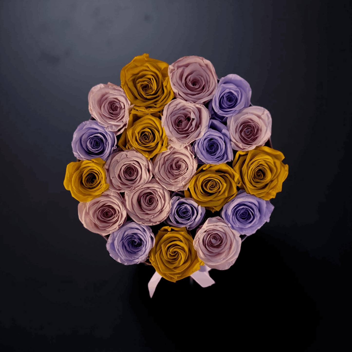 Pink, Yellow and Purple Roses in Round Design