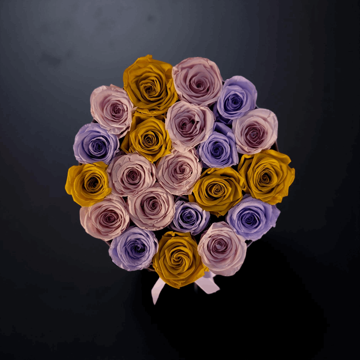 Pink, Yellow and Purple Roses in Round Design